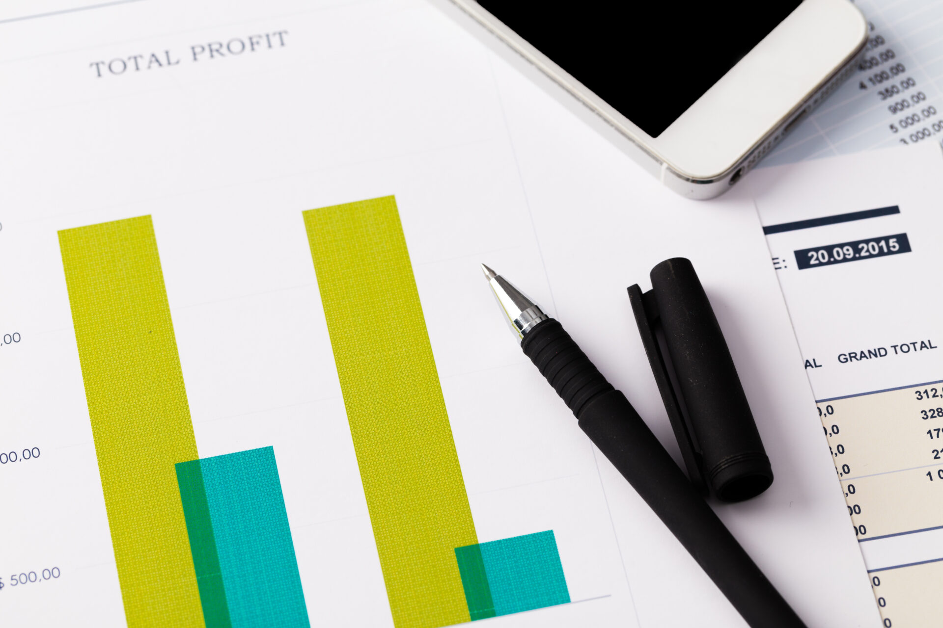 profit and loss reporting lucia co cpas Business and finance concept with financial chart, smartphone and pen