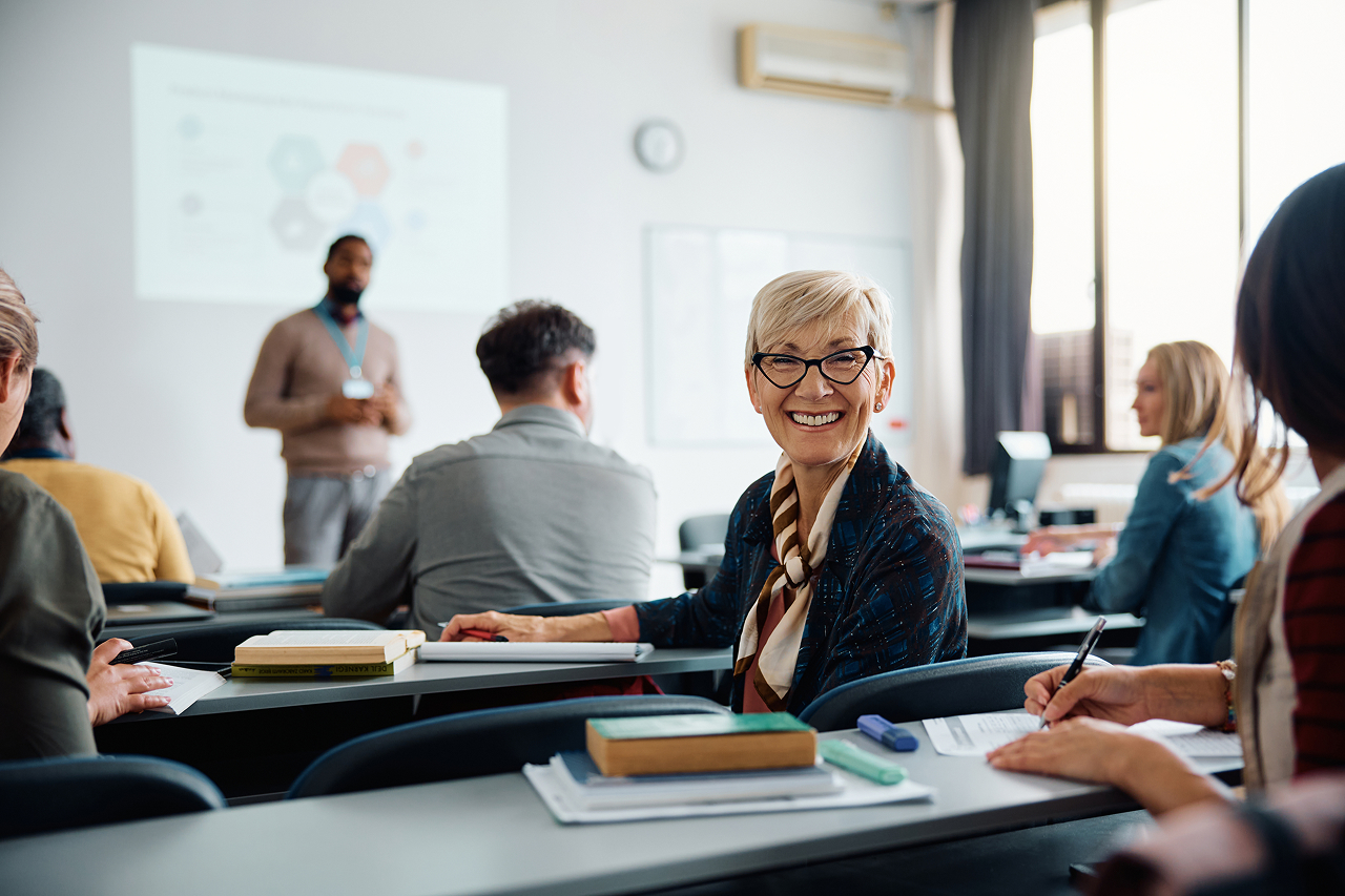 happy-mature-woman-on-education-training-class