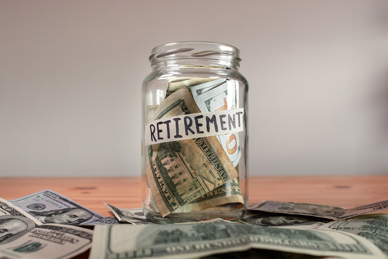 retirement-savings-in-glass-jar-with-money